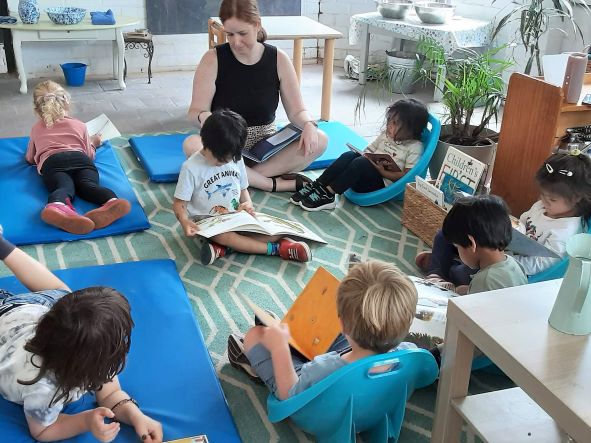 Group reading to young children