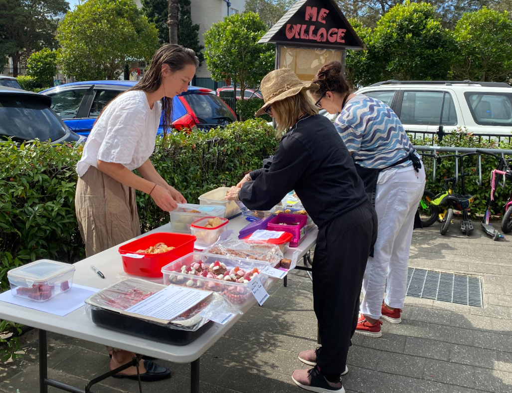 Mum volunteers at the bake sale